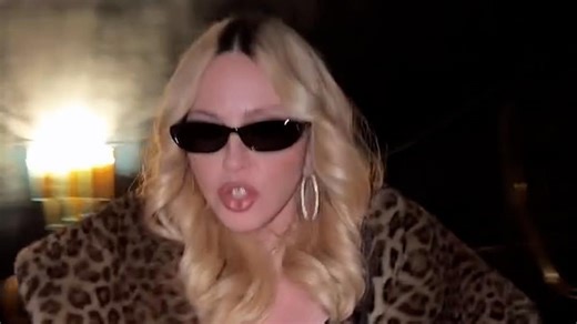 Madonna flaunts age-defying figure as she dances to 1992 hit