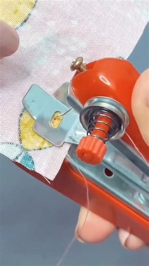 Product_Queen on Instagram: "This handheld mini sewing machine is a game changer for quick stitching and instant fabric repairs! 🧵✨ Perfect for beginners, travelers, and DIY lovers, this portable sewing machine lets you stitch clothes anytime, anywhere. No heavy machines, no hassle – just fast and easy sewing in seconds! Ideal for fixing torn clothes, hemming curtains, or quick fashion hacks. Compact, lightweight, and super easy to use – a must-have smart gadget for every home! #MiniSewingMachi