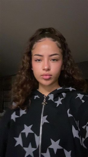 Cozy Indoor Style with Long Curly Hair