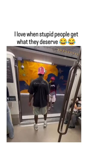@trending_contents_io | The video captures a man in shorts and a red cap attempting to jump onto a moving subway train's exterior, only to be flung off and land... | Instagram