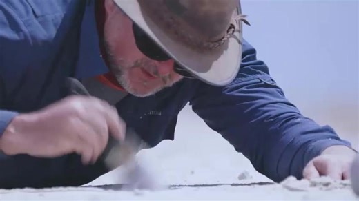 Discovery of fossilized human footprints in an ancient lakebed