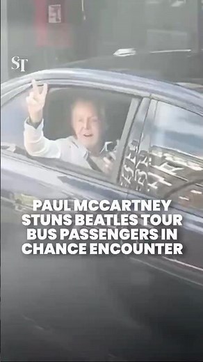 Paul McCartney delights fans on Beatles tour bus in a chance encounter in Liverpool