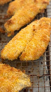 Crunchy Coconut Fish 4 ingredients to YUMMY! Seriously the easiest and tastiest fish you will make! Recipe: 4-5 pieces flounder 1/2 cup shredded coconut 1 cup panko crumbs 1 container @goldentastesalads roasted garlic dip. Mix the coconut and panko together in a large plate or bowl Add the garlic dip to a plate Coat the fish first in garlic dip and the dredge in the coconut panko mixture Lay on a baking rack over a sheet pan that has been sprayed very well with oil. Spray the top of the fish ver