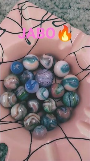 JABO marbles made in Ohio by Dave McCullough from the best stuff on Earth