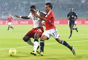 من ذاكرة | CAF FIFA WORLD CUP QUALIFYING ـــــــــــــــــــــــــــــــــــــــٕـــــــــ 📑 ودع المنتخب المصرى سباق التأهل نهائيات كأس العالم مونديال البرازيل بالرغم من فوزه فى مباراة الاياب على منتخب غانا 2-1 صعدت غانا الى نهائيات كأس العالم لكرة القدم للمرة الثالثة على التوالي والثالثة في تاريخها أيضا رغم هزيمتها أمام مصر في اياب الجولة الفاصلة بالتصفيات الأفريقية 2-1. وكانت مباراة الذهاب في غانا قد انتهت بتفوق غانا 6-1 لتصعد بمجموع المباراتين 7-3. افتتحت مصر التسجيل بهدف عمرو زكي في الدقيقة