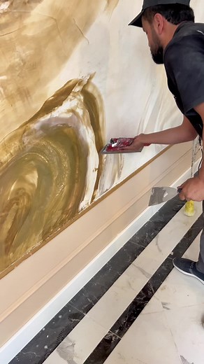 Marbled Art Creation Process on a Wall