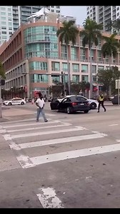 Police officer rides the hood of a suspect in Miami | Eric Fox