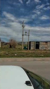 Road trip through the Persian countryside with small villages and amazing skies