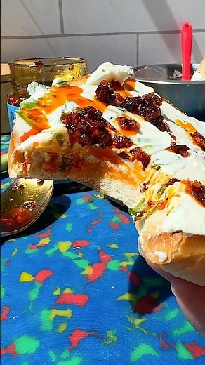 POV you just discovered the best bagel topping #foodie #chili #shorts