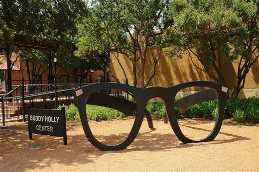 Buddy Holly Center visitors respect the music icon