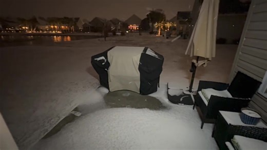 Anchor Rachel Bogle showing the snow in Surfside Beach. | WMBF News