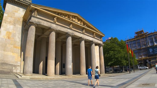 Walking past a historic monument in Berlin