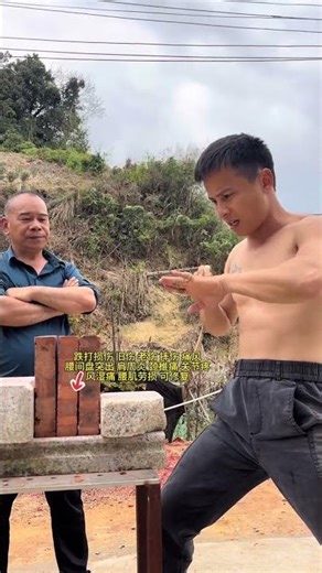 Relax arm, clench fist, push out. Promote Jingwu spirit
