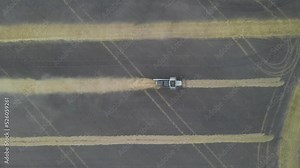 Harvesting of grain crops.Harvesting wheat,oats and barley in fields,ranches and farmlands.Combines mow wheat in the field.Agro-industry.Combine Harvester Cutting on wheat filed.Machine harvest wheat