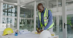 Serious architecture man drawing blueprint lines with design process, planning development and builder project tools. Floor plan construction and focus of engineer black person or business contractor