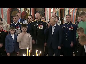Putin with Russian officers and their families attends Orthodox Divine Liturgy service