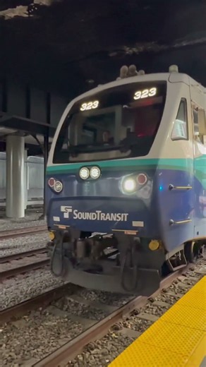 (Northbound) Sounder Train SDRX 323 (1704 / N Line) departs the King Street Station.