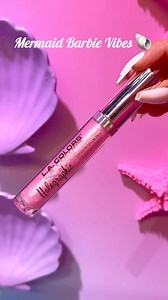 Mermaid Barbie lips are in this summer 😎🧜‍♀️💋 You can get your Holographic Iridescent Lipgloss at select @fivebelow stores! 🩷 #lacolorscosmetics #fivebelowfinds #makeuptutorial #barbielipgloss #mermaidbarbie | LA COLORS Cosmetics