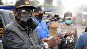 Indonesia volcano eruption forces 100,000 to flee