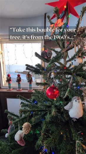 Our Tower Home on Instagram: "A Christmas homecoming 58 years in the making 🎄❤️ This little red bauble first hung in the Watchtower back in the 1960s. Today, it’s back on the tree exactly where it belongs. A year after we moved in, the doorbell rang. Standing there were Ian and Violet—who called this tower home in 1967. They were only 22 and 23 at the time, kindred spirits who fell in love with the sea and saw an opportunity where others only saw a project. They spent the afternoon with me, sha