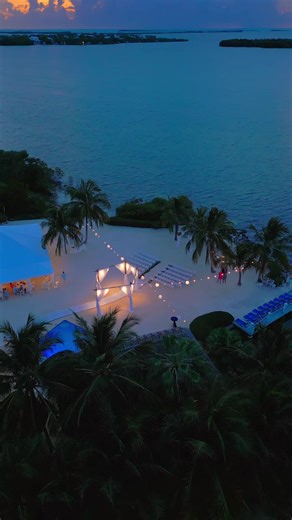 Experience the breathtaking allure of Key Largo Lighthouse as day transitions into night. The captivating colors of the sunset serve as the perfect backdrop, casting a warm glow across the ocean and our venue. Each moment is a picturesque spectacle, a living canvas celebrating nature's beauty and love's magic. Let the vibrant hues of the horizon inspire your dream wedding here at our slice of paradise. 🌅💖 • • • #keylargolighthouse #destinationwedding #weddingvenue #floridawedding #beachwedding