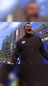 “It’s like a 26-mile parade!” Gronk held up the trophy at the Boston Marathon finish line as we wait for the winners! | WCVB Channel 5 Boston