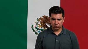 us american flag and mexican flag waving together. relations between usa and mexico