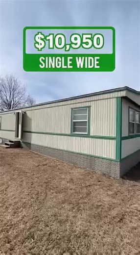 single wide mobile home priced at $10,950. Single-wide mobile home priced at $10,950.e sits level with a straight roofline. Inside, the flooring feels firm and the layout is simple and practical for everyday use. The living area offers usable space, while the kitchen includes older yet functional cabinets with working plumbing. The bedroom provides solid flooring, and the bathroom works properly with only a small cosmetic issue. Overall, this is an affordable and realistic housing option. Would 