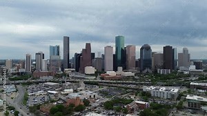 Downtown Houston, Texas skyline with traffic in the background on a busy freeway