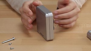 Hörmann Funk-Codetaster FCT 10-1 BS (868 MHz, für bis zu 10 Torantriebe, Tastatur beleuchtet, Klappdeckel, Farbe RAL 9006) 4511861, grau