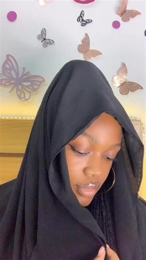 Adjusting Style: Colorful Tie-Dye and Black Garment