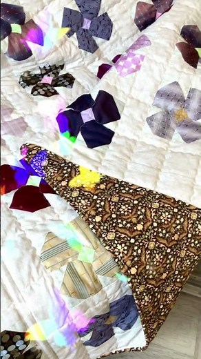 An Overview of a Patchwork Quilt Sewn from Men's Ties.