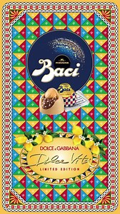 The exquisite partnership with Baci Perugina travels on a sweet journey to the Italian soul with the limited-edition #BaciDolceVita pralines composed of a soft gianduja heart, lemon-flavored nibs and crunchy whole hazelnut, all coated in white chocolate with notes of vanilla. A taste experience of pure and joyful fondness to celebrate love without boundaries. #DGBaci #BaciPerugina | Dolce & Gabbana