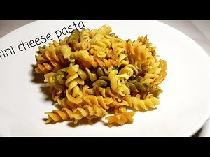how to make rotini pasta dish simple and easy with shredded Cheese