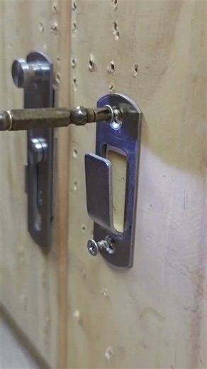 "Step-by-step tutorial on how to install a stainless steel sliding door latch"