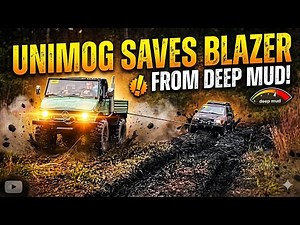 Unimog pulling a Chevy blazer out of “the hoop” at Overland south