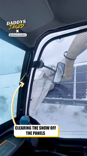 Removing snow to keep solar panels clean. | DaddysJuiced