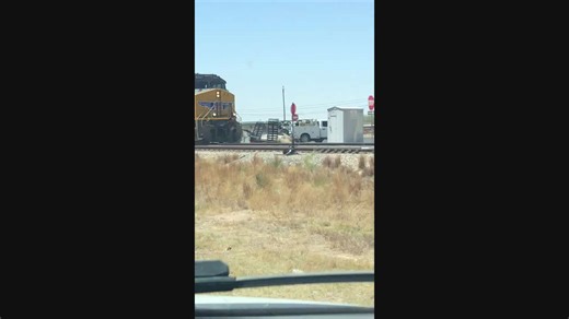 Train Collides with Truck Stuck on Tracks