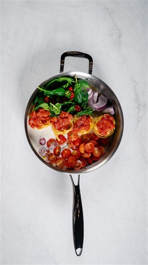 Invisible Cooking with Invisacook Europe on Instagram: "Today, we’re presenting a viral one-pan pasta prepared using Invisacook’s invisible induction technology. All the ingredients go straight into the pan — tagliatelle, cherry tomatoes, onion, baby spinach, chili pepper, tomato sauce, salt, black pepper, heavy cream, broth, oregano, basil, and mozzarella. Everything cooks together in one pan, creating a rich, flavorful dish with minimal effort and no mess. This recipe is prepared on Invisacook