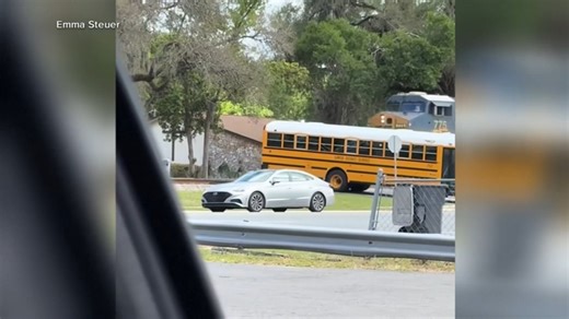 School bus driver arrested after driving bus full of children onto train tracks | Video