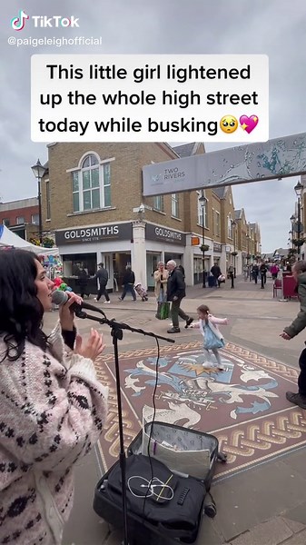 Adorable Little Girl Busker Brightens Up High Street with Singing and Dancing