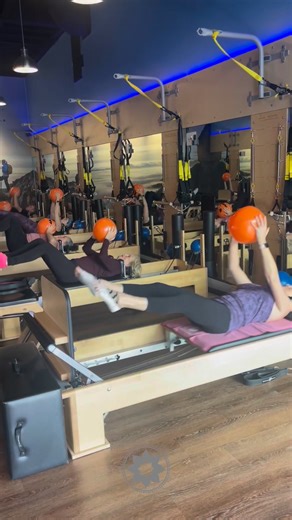 🎃 Things are getting a little spooky in the studio! 👻 Our jack-o-lantern balls have taken over — bringing some festive fun to your Pilates practice this week! Come get in the Halloween spirit and keep those pumpkins rolling through Halloween! 🧡🖤 | Club Pilates