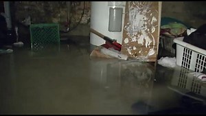 Downpour causes basement blooding in Kingston