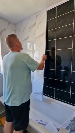 No need to remove your existing tiles, just panel over them! As shown by thebridgesathome #pvcpanels #ShowerPanels #bathroominspo #dbsbathrooms #wallpanelling #wallpanels | DBS Bathrooms
