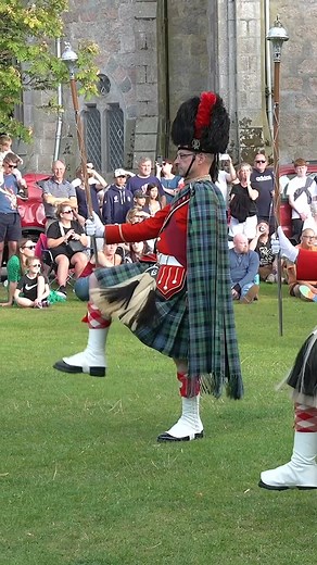 Ballater & District Pipe Band begin their marching display after reforming the pipers and drum corps on Ballater Green. This was part of their displays during Beating Retreat after Ballater Highland Games on Thursday 10th August 2023. The band are led here by Drum Majors Ian Esson and Fiona Glennie, together with Pipe Major James Cooper, and began with the tune Caber Feigh. #ballater #highlandgames #deeside #aberdeenshire #scotland #pipeband #marchingbands #drummajor #bagpipes #pipesanddrums #ba