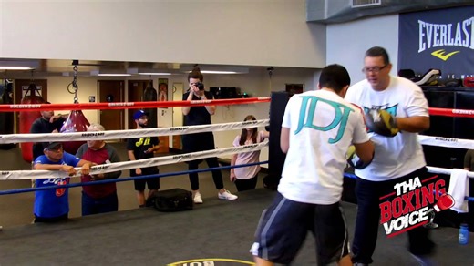 Joseph Diaz doing pad work in camp