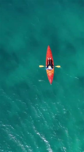 Ghostly Shadow Beneath a Kayak