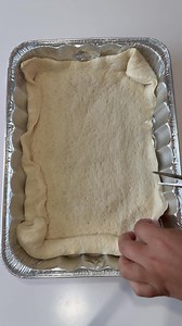 This easy, mess-free Braided Calzone comes together in a foil pan, perfect for gifting a meal or stocking your freezer! Pair it with a simple salad and a sweet treat for a thoughtful dinner that’s as delicious as it is convenient! 🙌😋 Recipe below! 1. Roll out refrigerated pizza dough in a foil pan. Cut 8–10 slits along each long side. 2. Add your favorite toppings and seasonings in the center. 3. Fold the dough strips over the filling to create a braid. 4. Brush with olive oil and bake at 400°