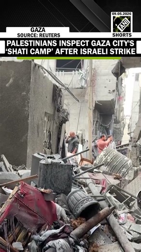 Palestinians inspect damage at site of Israeli airstrike on Gaza City's Shati camp
