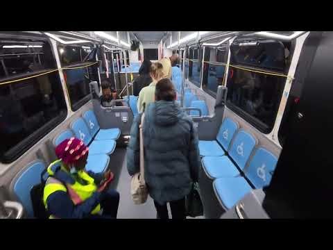 Boarding Bus: Ride On 2024 Gillig Low Floor Electric Vehicle Bus #44172E on Route 34 to Bethesda
